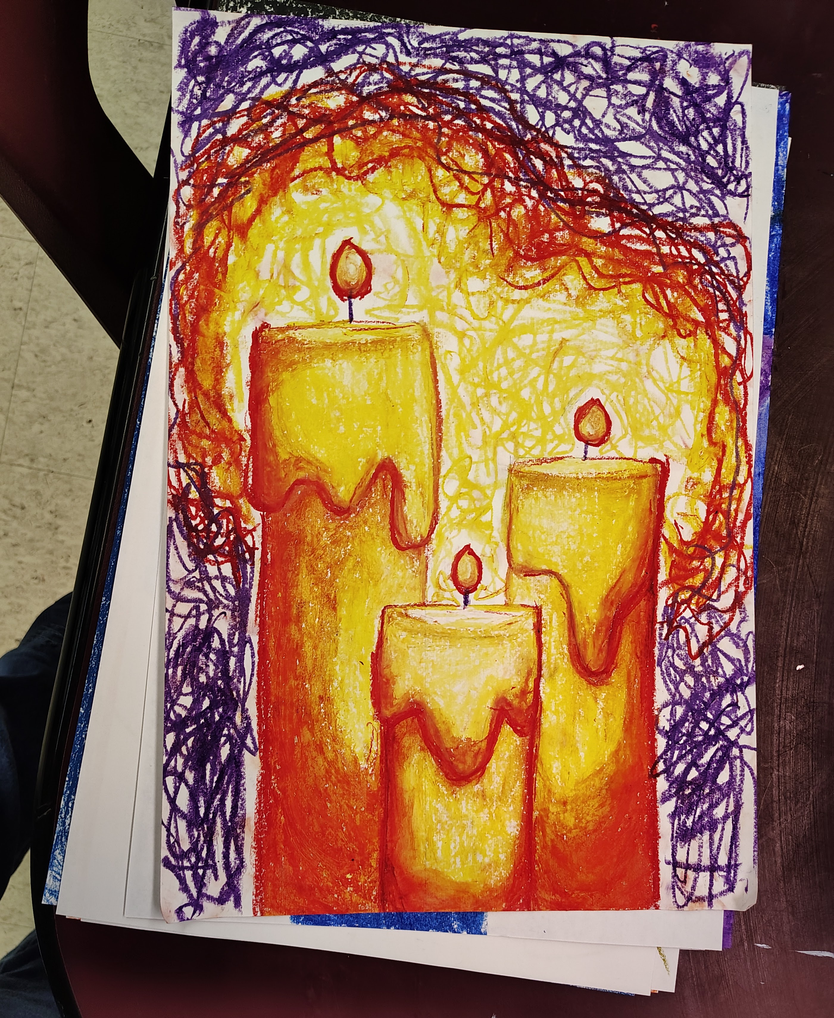 Three yellow candles with red shading on a purple background. Done with oil pastel